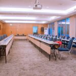 An empty conference room is ready for a meeting.