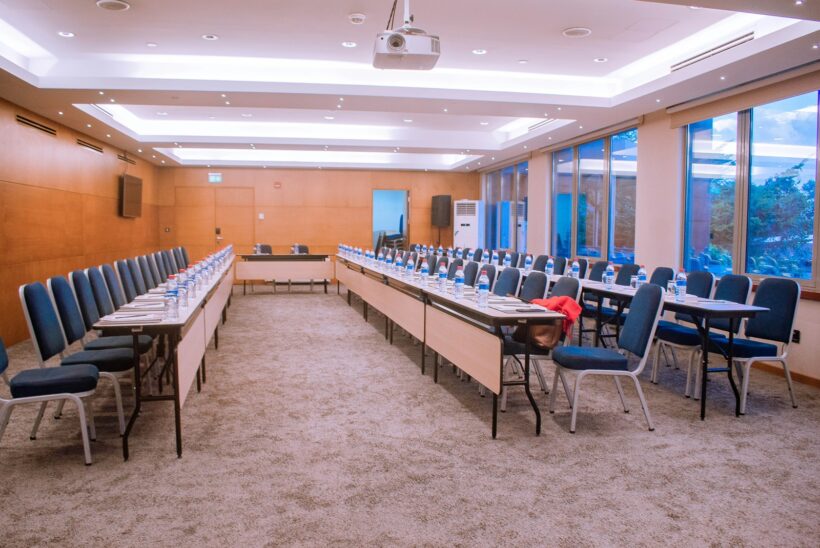 An empty conference room is ready for a meeting.