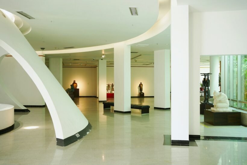A large room with a spiral staircase in it