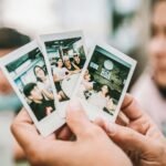 person holding 2 women photo