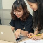 woman using MacBook